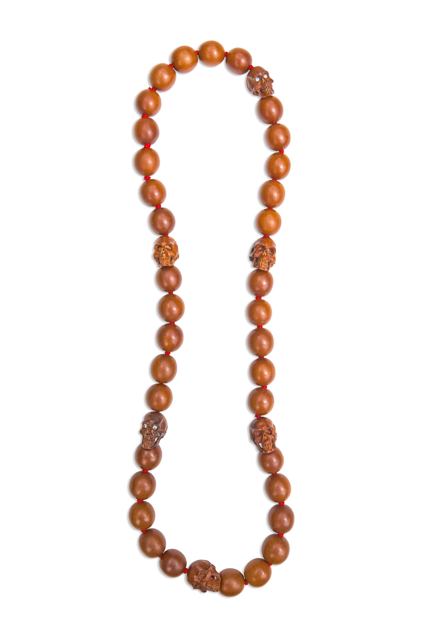 Carved Sawo Wood Skulls with Diamond Eyes Necklace